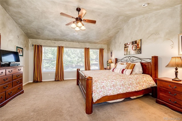 24036 E Kettle Pl, Aurora, CO 80016 - bedroom with multiple windows, light colored carpet, a ceiling fan, and vaulted ceiling
