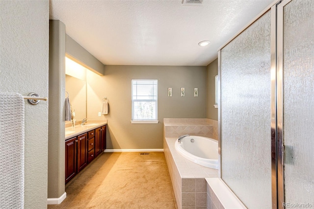 24036 E Kettle Pl, Aurora, CO 80016 - full bath with a garden tub, double vanity, and a shower stall