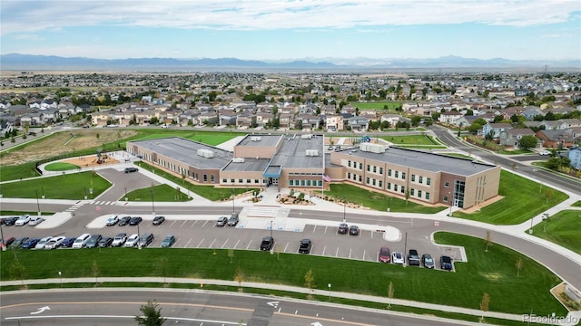 bird's eye view featuring a residential view and a mountain view