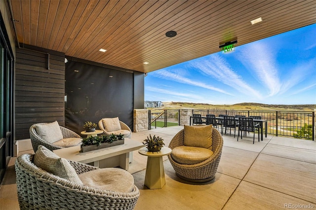 balcony featuring outdoor dining area