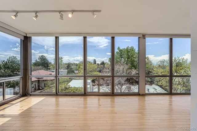 3100 E Cherry Creek S Drive 404, Denver, CO 80209 - unfurnished sunroom with rail lighting