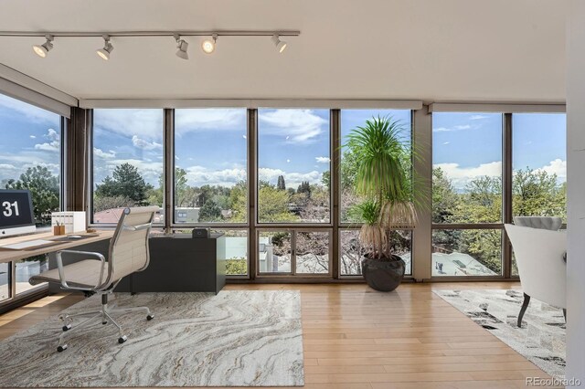3100 E Cherry Creek S Drive 404, Denver, CO 80209 - sunroom with rail lighting and healthy amount of natural light