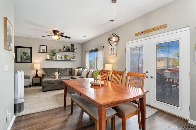 10475 E Abilene St, Commerce City, CO 80022 - dining area featuring dark wood-style floors, ceiling fan, french doors, and baseboards