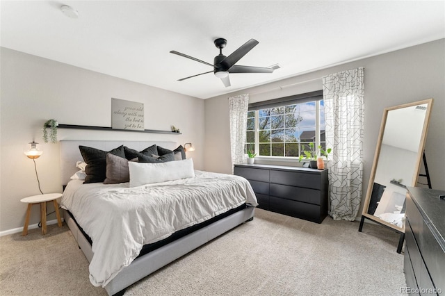 10475 E Abilene St, Commerce City, CO 80022 - bedroom with light carpet, a ceiling fan, and baseboards