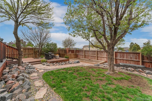 10475 E Abilene St, Commerce City, CO 80022 - fenced backyard featuring a wooden deck