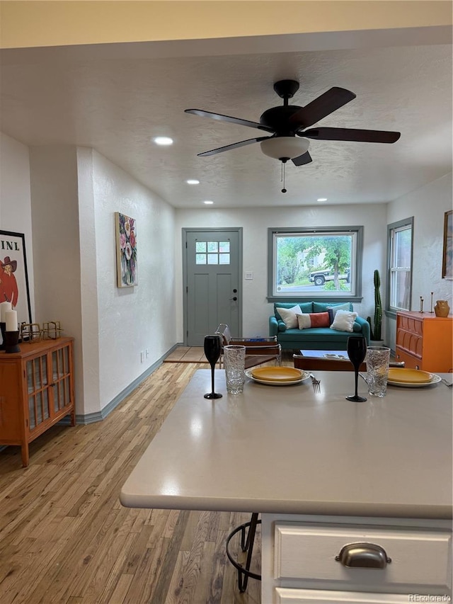 520 W San Miguel St, Colorado Springs, CO 80905 - kitchen featuring light wood-style floors, baseboards, a ceiling fan, and recessed lighting