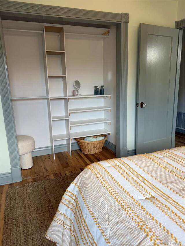 520 W San Miguel St, Colorado Springs, CO 80905 - bedroom with wood finished floors and baseboards