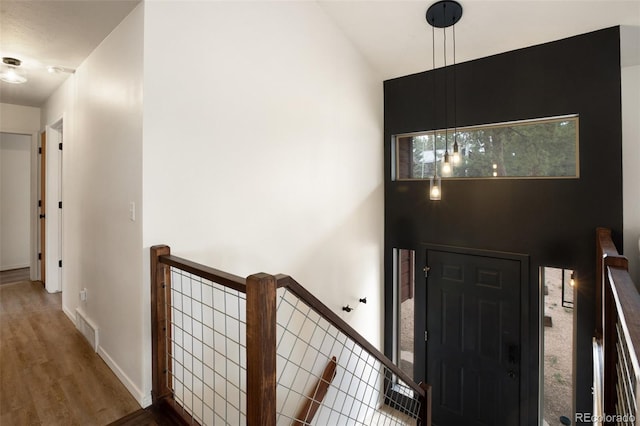 121 Aspen Dr, Woodland Park, CO 80863 - foyer featuring wood finished floors and baseboards