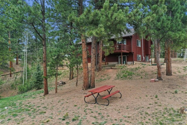 121 Aspen Dr, Woodland Park, CO 80863 - view of yard featuring a deck