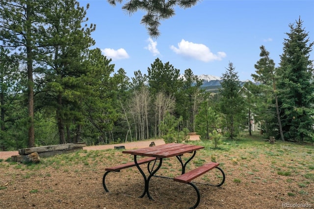 121 Aspen Dr, Woodland Park, CO 80863 - view of home's community featuring a wooded view