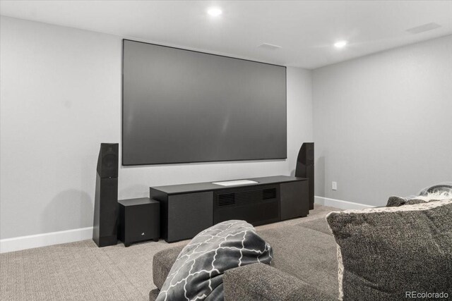 home theater with recessed lighting, baseboards, light carpet, and visible vents