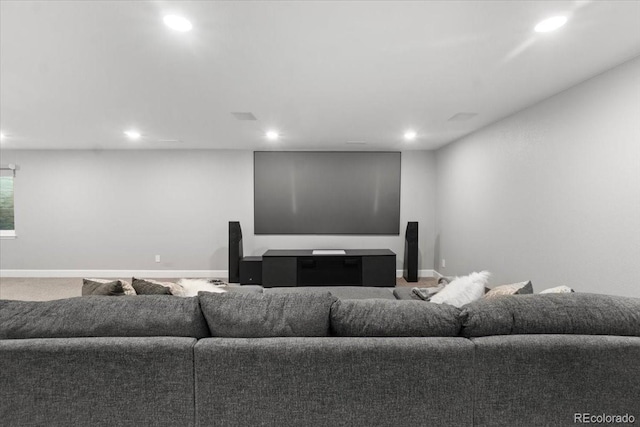 carpeted living room featuring recessed lighting and baseboards