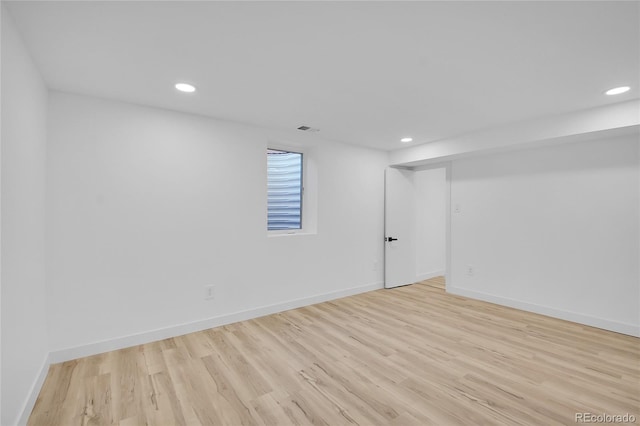 basement with light wood-type flooring