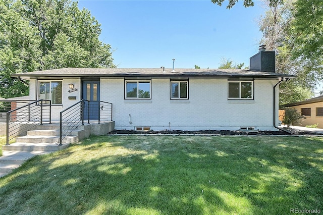 view of front of house with a front lawn