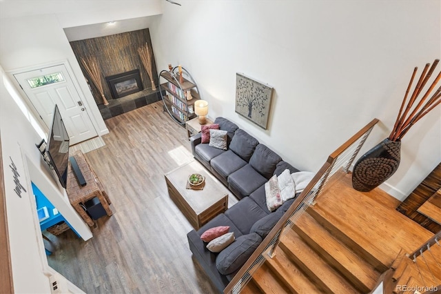 8170 E Phillips Cir, Centennial, CO 80112 - living area featuring light wood finished floors and a large fireplace