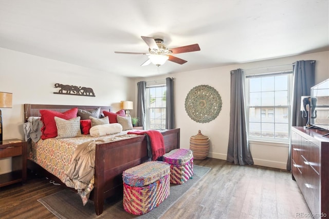 8170 E Phillips Cir, Centennial, CO 80112 - bedroom featuring wood finished floors, ceiling fan, and baseboards