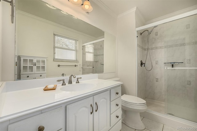 bathroom with a stall shower, toilet, ornamental molding, tile patterned floors, and vanity