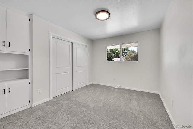2503-2507 N Taft Ave, Loveland, CO 80538 - unfurnished bedroom with carpet flooring and a closet