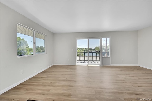 2503-2507 N Taft Ave, Loveland, CO 80538 - spare room featuring healthy amount of natural light and light wood-style flooring