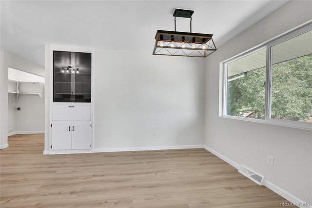 2503-2507 N Taft Ave, Loveland, CO 80538 - unfurnished dining area featuring light wood-type flooring