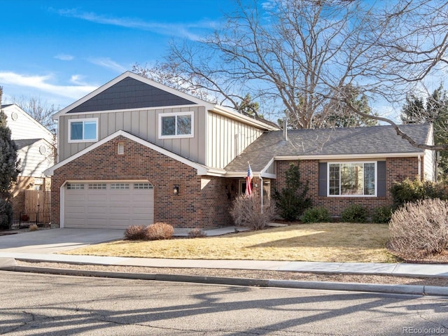 view of front facade with driveway, an attached garage, board and batten siding, and brick siding