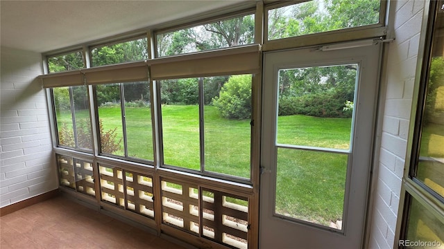 655 S Alton Way Unit 6A, Denver, CO 80247 - unfurnished sunroom featuring healthy amount of natural light