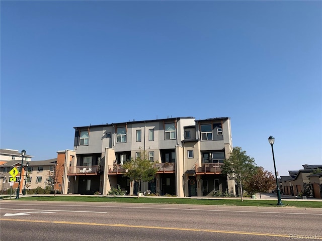 view of property with a residential view