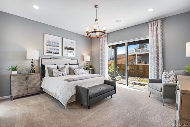 bedroom with access to outside, a chandelier, and light carpet