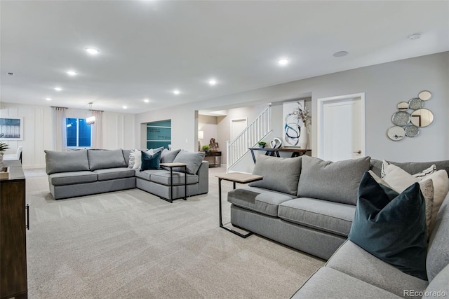 living room featuring light colored carpet