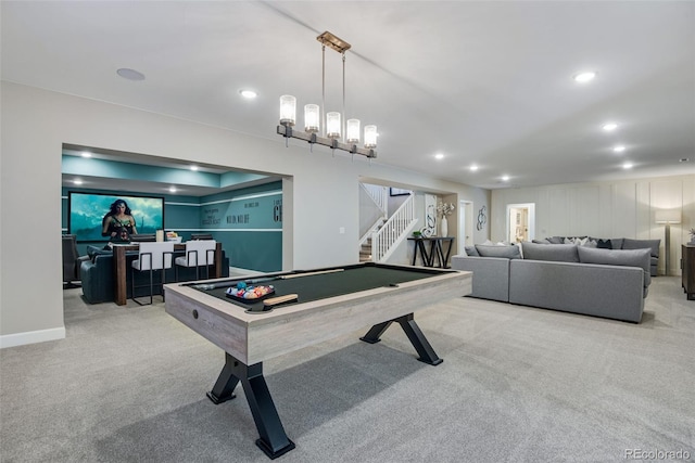 rec room featuring bar, light carpet, and pool table