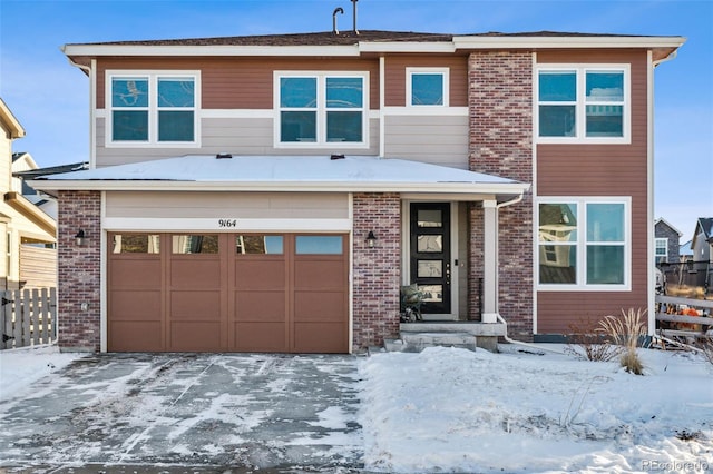 view of front of property featuring a garage