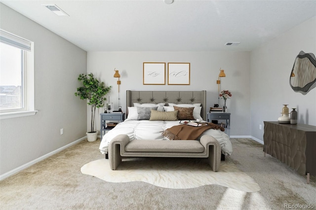 bedroom with light carpet