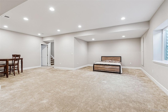 sitting room with light colored carpet