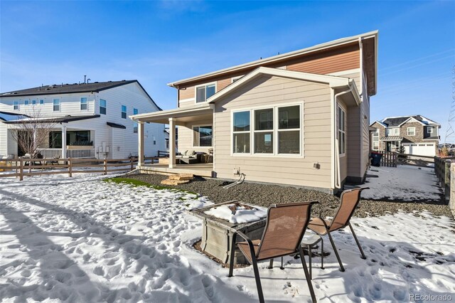 view of snow covered house