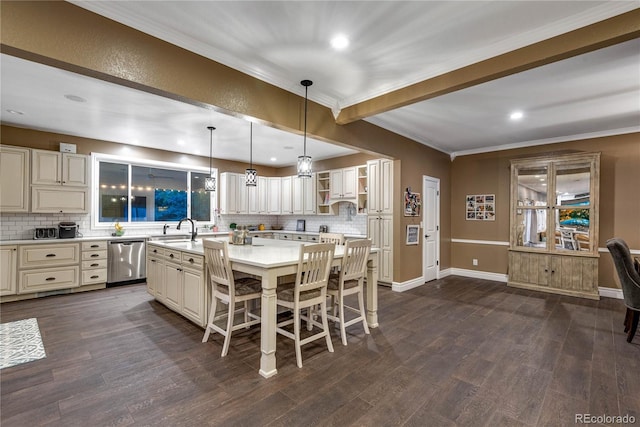 kitchen with a sink, ornamental molding, backsplash, and dishwasher