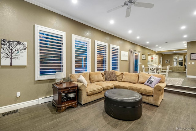 living area with ceiling fan, visible vents, wood finished floors, baseboards, and recessed lighting