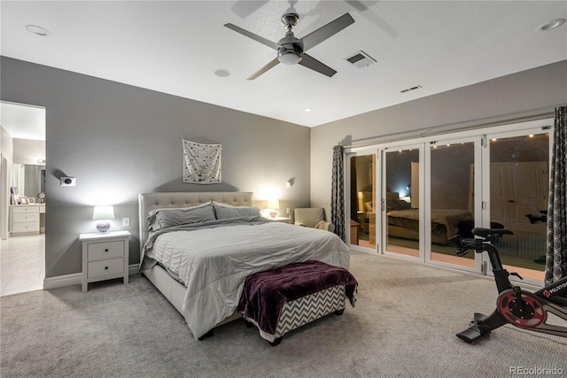 bedroom featuring access to outside, ceiling fan, light colored carpet, and visible vents