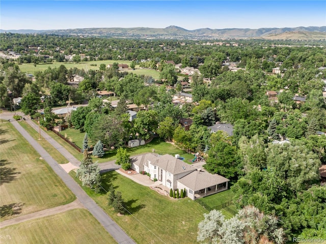 birds eye view of property featuring a mountain view