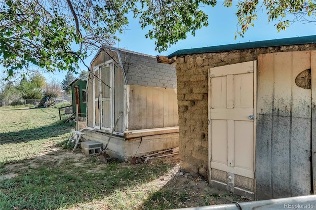 view of outdoor structure with a yard