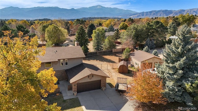 drone / aerial view featuring a mountain view