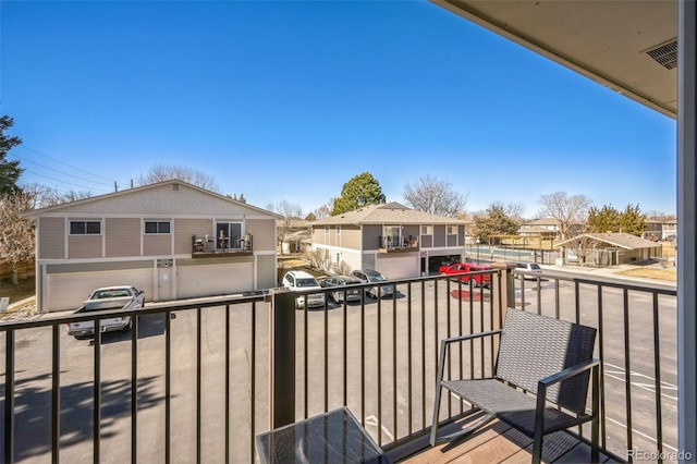 balcony featuring a residential view