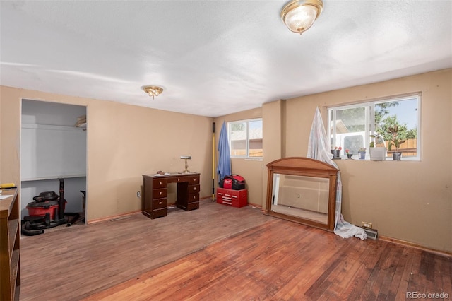 miscellaneous room featuring hardwood / wood-style flooring