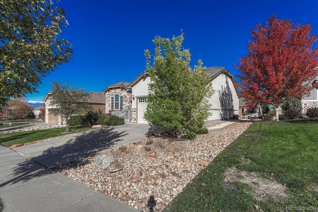 obstructed view of property with a front lawn and a garage