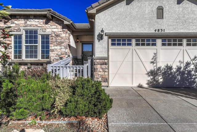 entrance to property with a garage