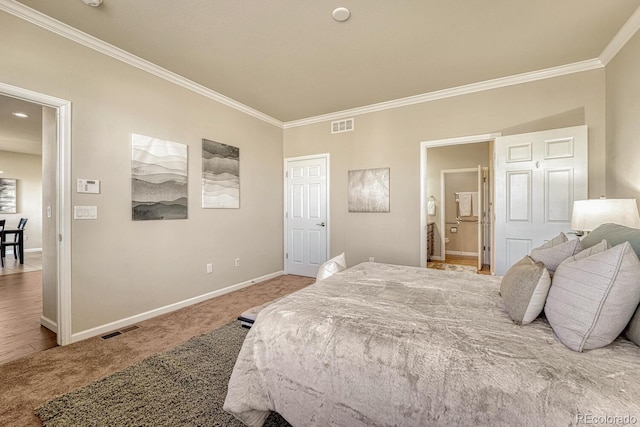 carpeted bedroom featuring crown molding