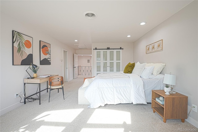 bedroom featuring light carpet