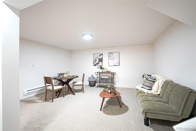 interior space with carpet and a baseboard heating unit