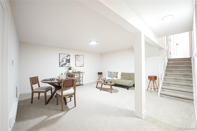 view of carpeted dining area