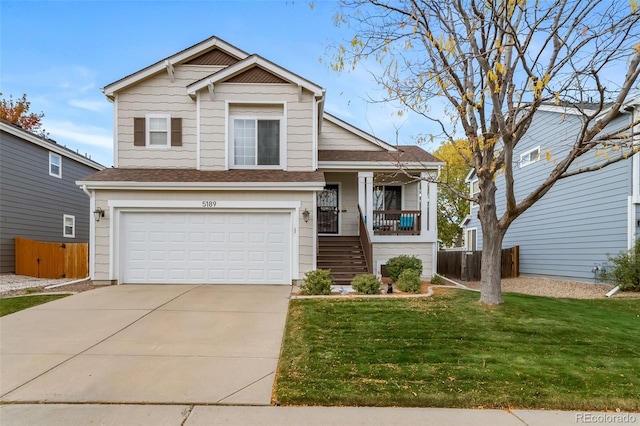 view of front of house featuring driveway, an attached garage, a porch, a front yard, and stairs