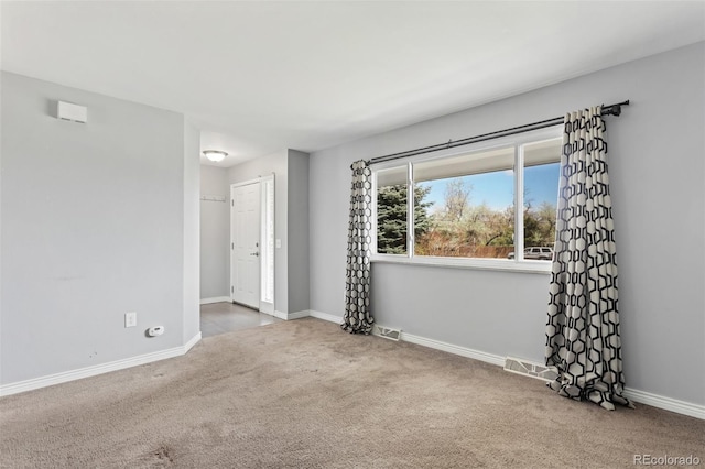 6711 S Race St, Centennial, CO 80122 - carpeted empty room with baseboards